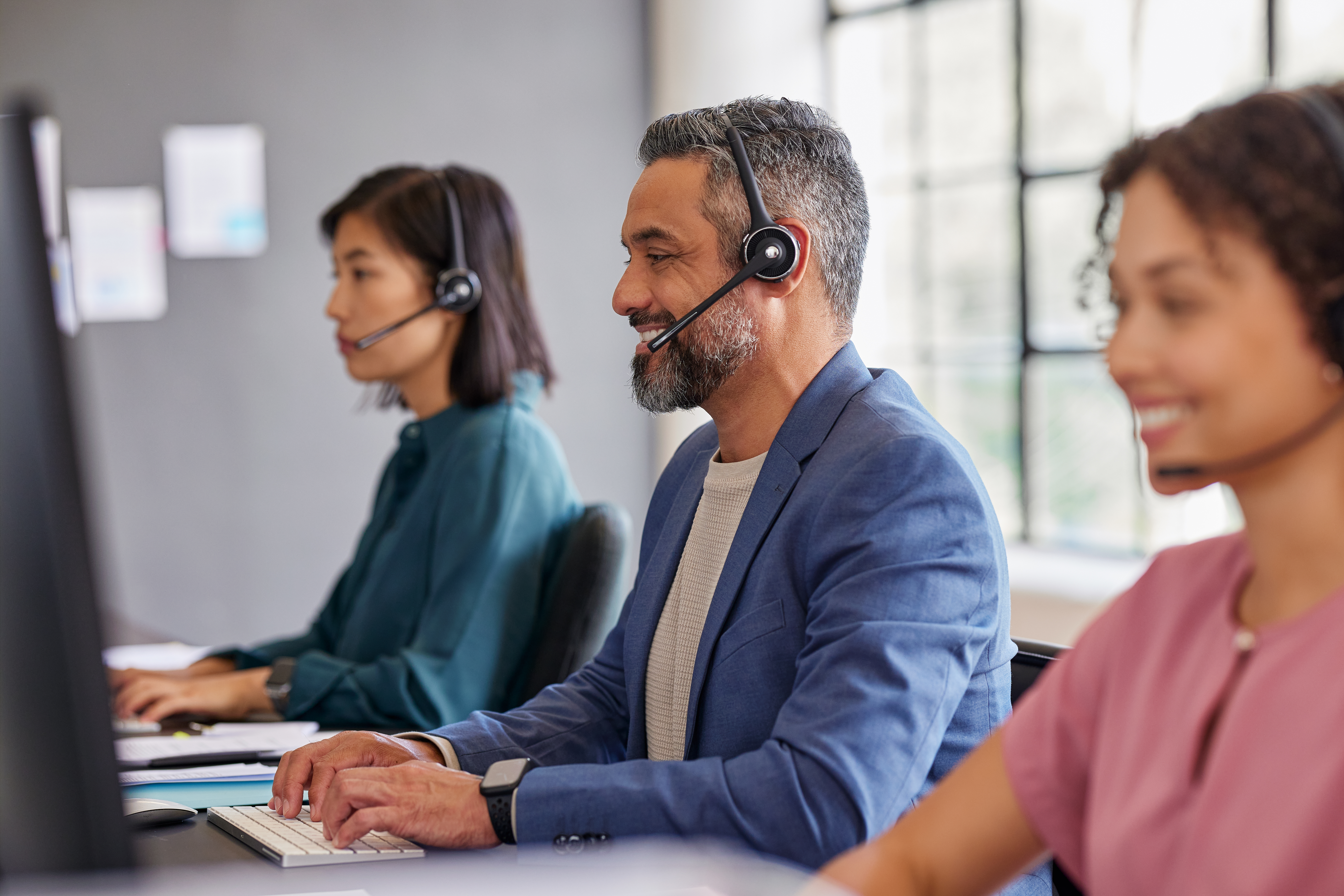 Middle eastern customer service agent working in a call center Middle eastern customer service agent working in a call center