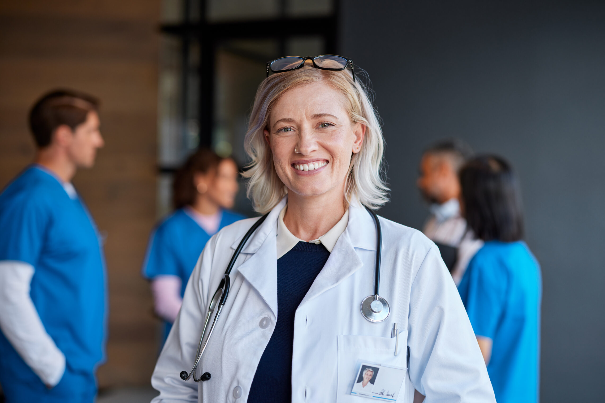 Smiling mature female physician in hospital Smiling mature female physician in hospital