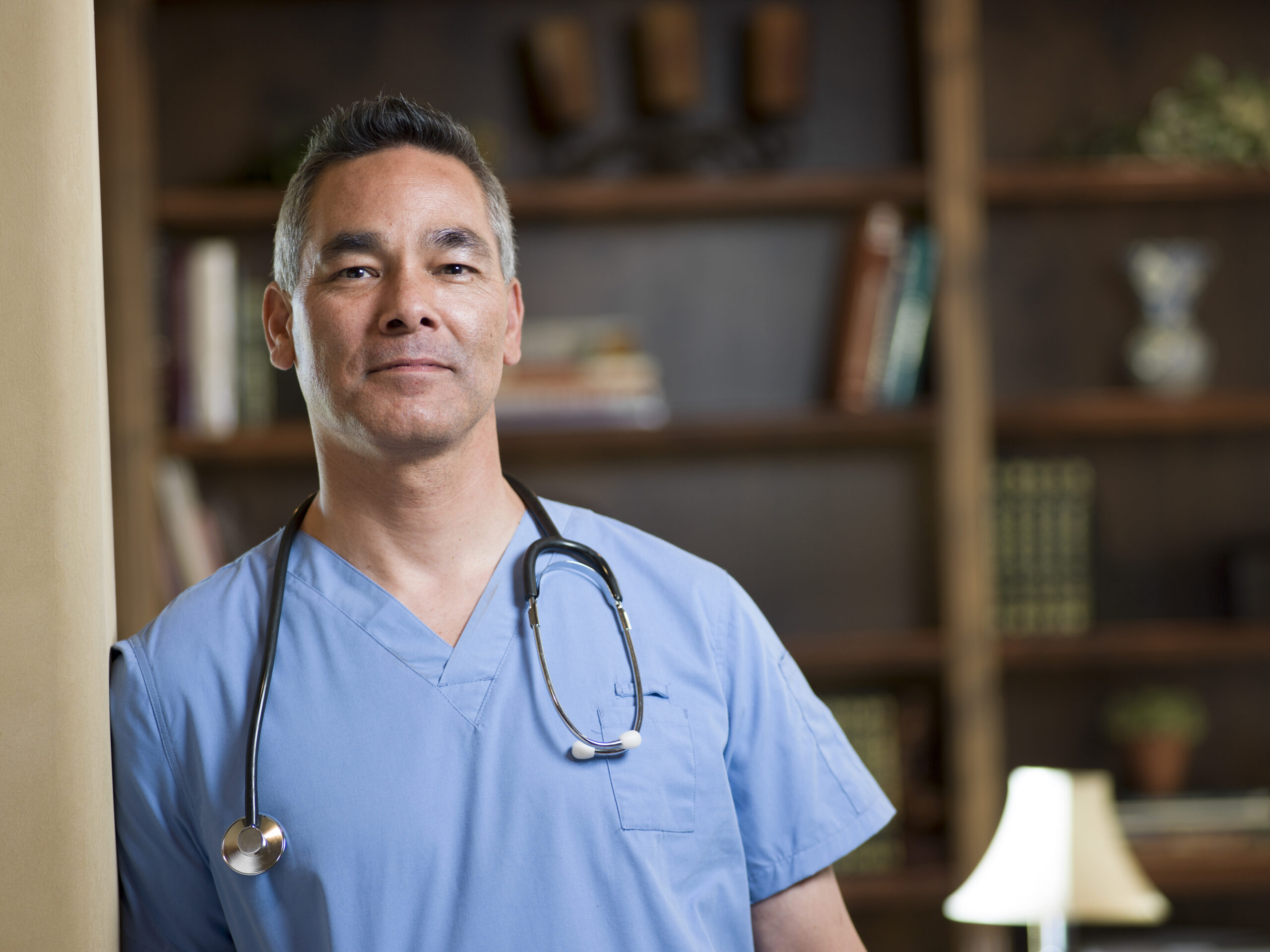 portrait of smiling mature doctor in office 2025 04 04 20 59 14 utc